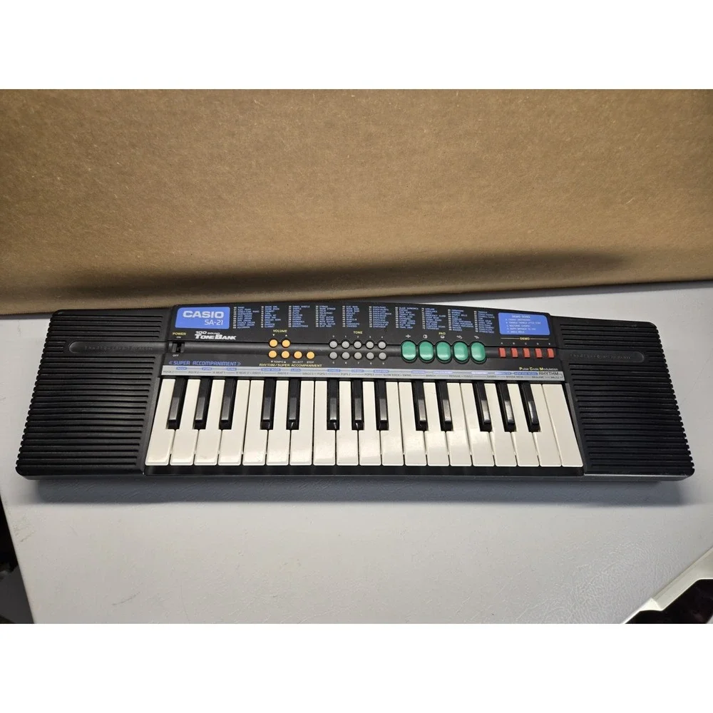 Casio SA-21 Electric Synth Keyboard Portable 100 Sound Tone Bank Dual Speakers